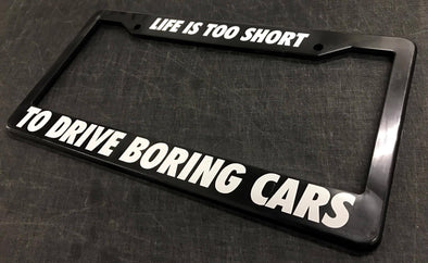 Life is too Short to drive boring cars License Plate Frame